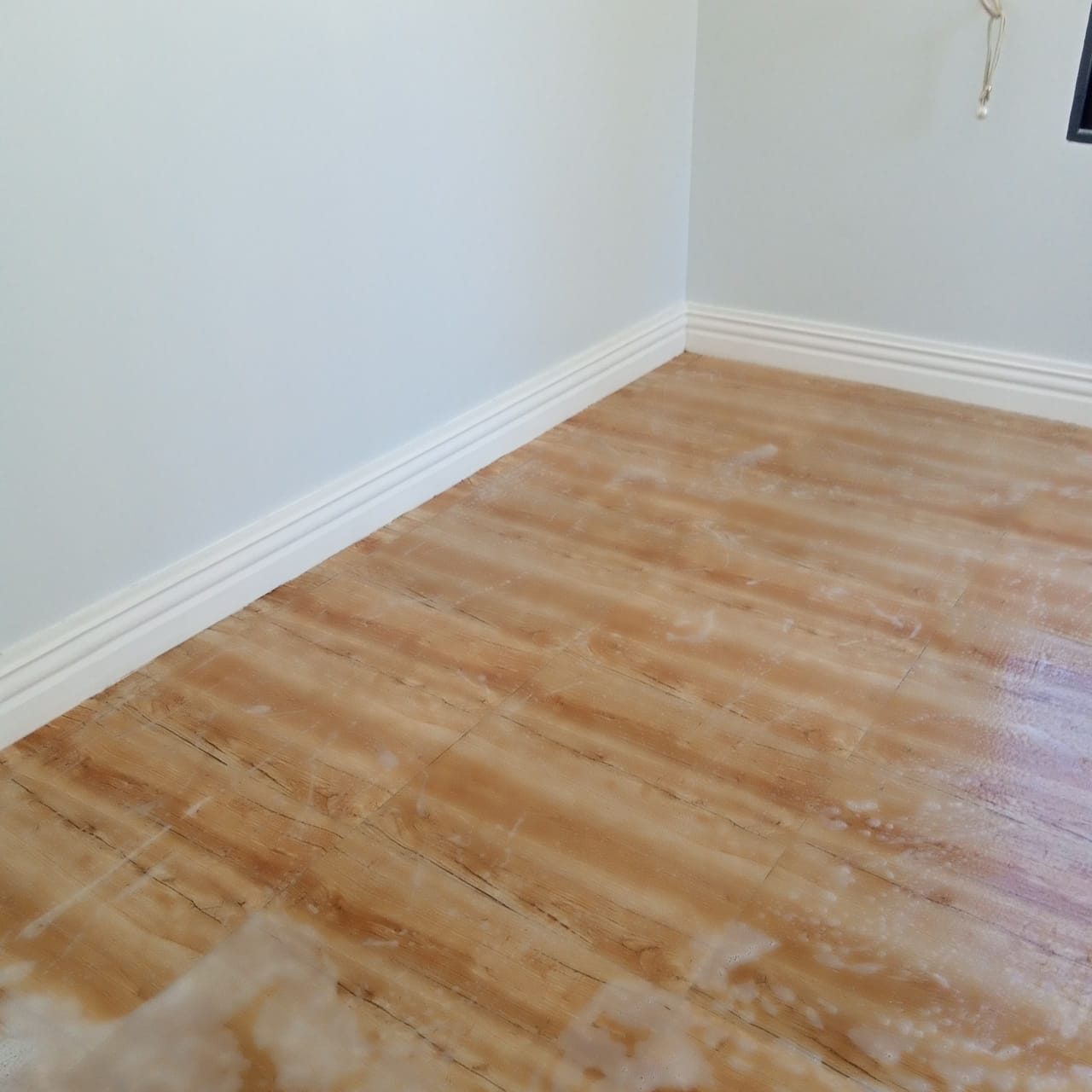 Freshly cleaned wooden-look floor